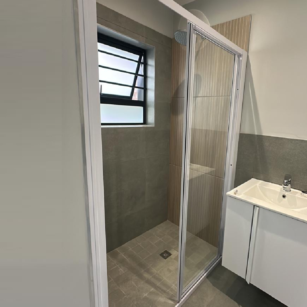 bi-glide shower
